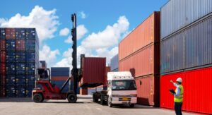 China sourcing agent reviewing industrial machinery for import
